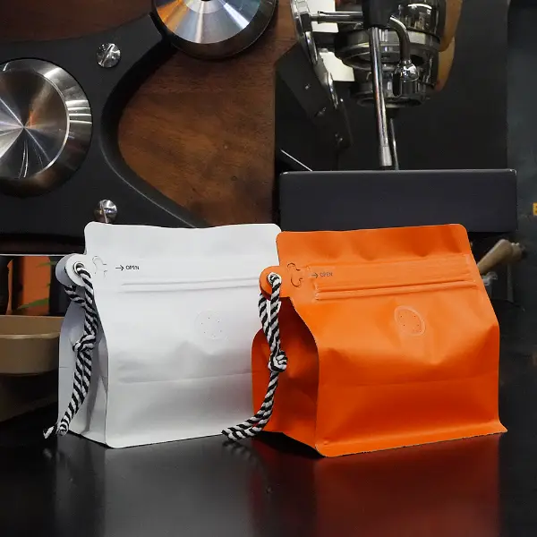 white and orange 150g stock coffee bags with lanyard front view