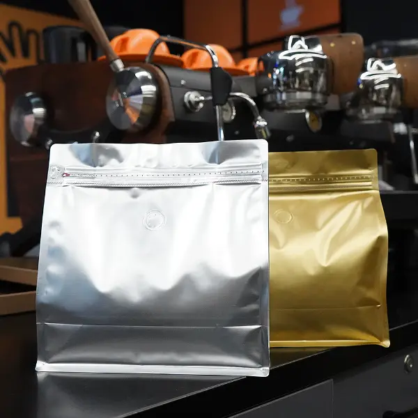 1kg horizontal stock bags in silver and gold colors for coffee packaging