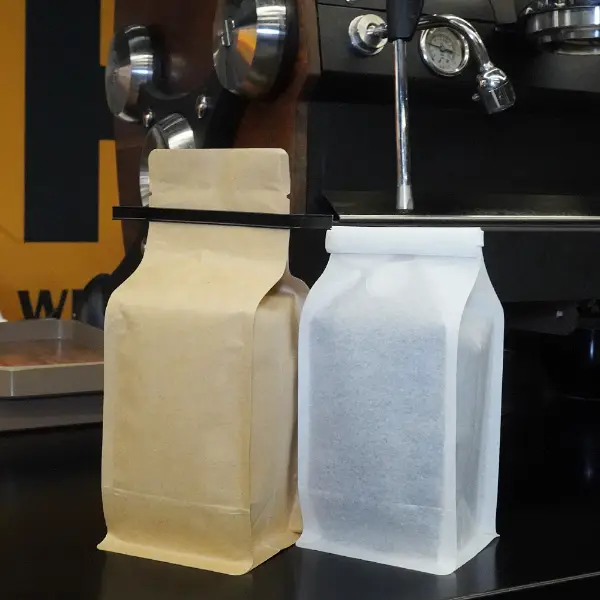 250g stock bags with tin tie displayed in a professional coffee shop environment