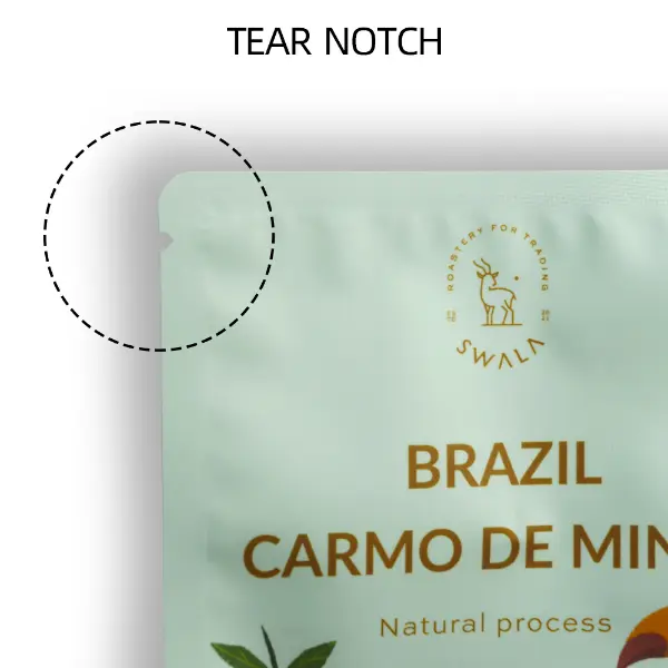 Tear notch detail on drip coffee pouch for easy opening
