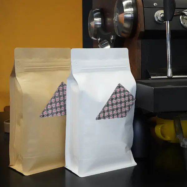 Flat bottom kraft paper coffee bags with card window side view
