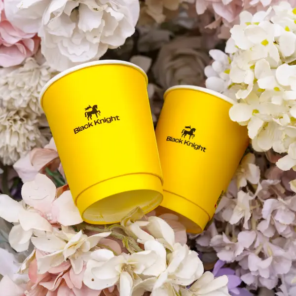 Custom logo PET ice cup in yellow designed for coffee shops and beverage brands