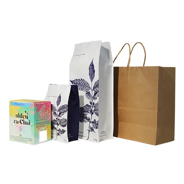 XL kraft paper gift bags holding coffee bags and boxed items for gifting and retail use